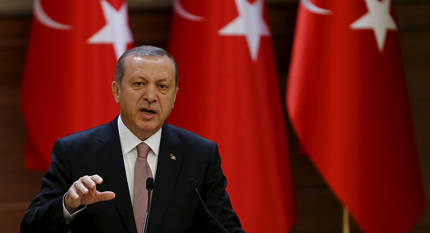 Turkish President Erdogan makes a speech during his meeting with mukhtars at the Presidential Palace in Ankara, Turkey